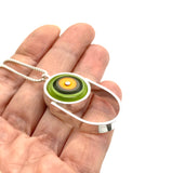 Oblong Circle Necklace in Orange, Green, and Gray Glass and Sterling Silver