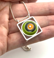 Circle in Square Necklace in Lime Green, Tangerine Orange, and Gray Glass and Sterling Silver